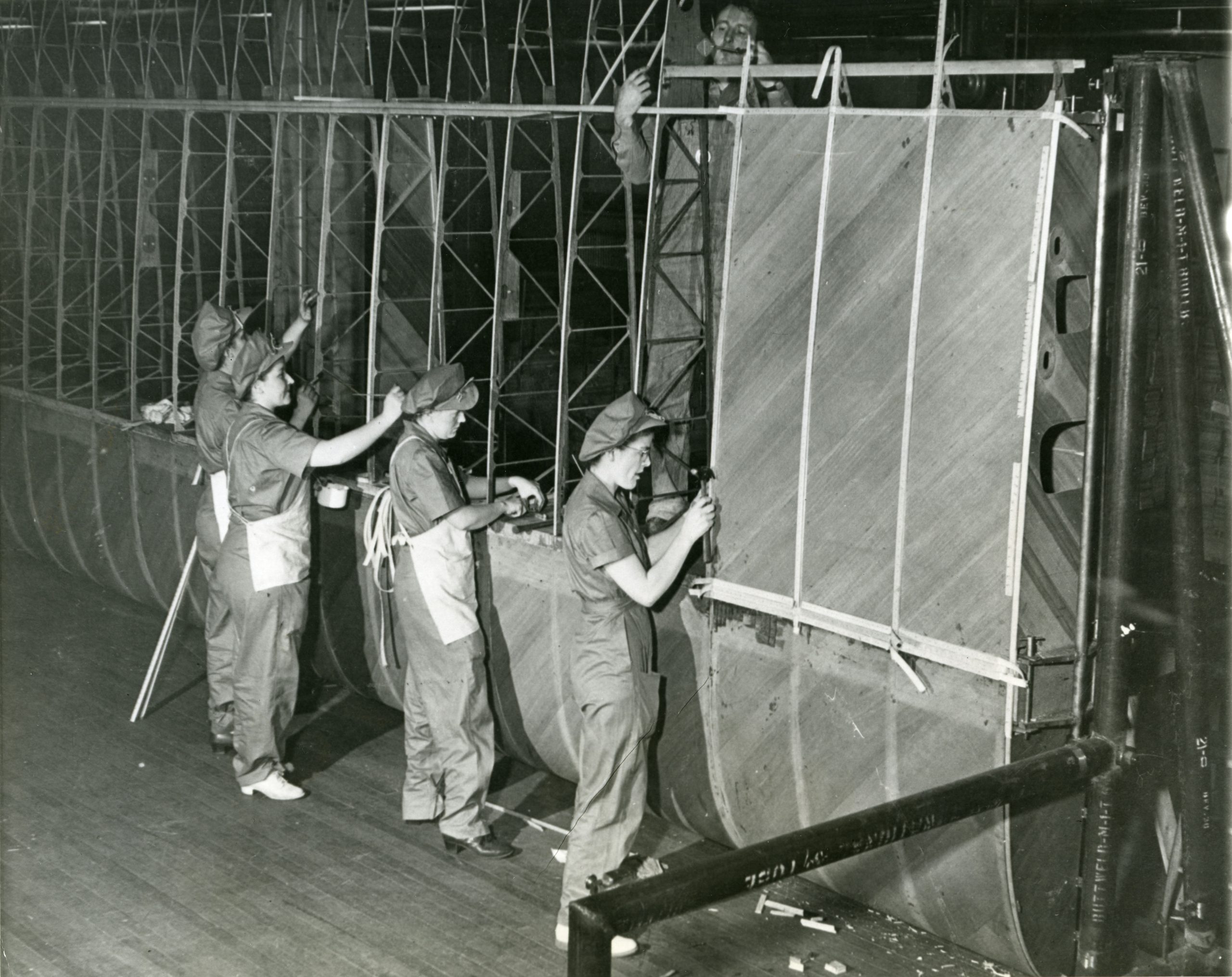 Women workers assembling a glider wing at the H. J. Heinz Company, 1942-1943.