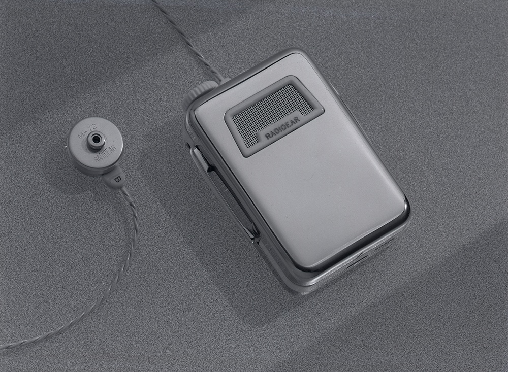 A photograph of a Radioear hearing aid, taken for the industrial designer Peter Muller-Munk, 1952.