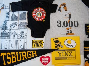 A flat lay of Pittsburgh-themed shop products.