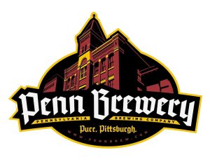 Logo for Penn Brewery showing a stylized historic building in gold above bold white text that reads “Penn Brewery.” Below the main text, it says “Pennsylvania Brewing Company” and “Pure. Pittsburgh. History uncorked at www.pennbrew.com.”.