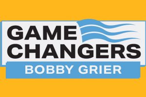 Logo with Game Changers in bold black, blue wave lines above Bobby Grier in white on blue, set on an orange background. *AI generated alt text