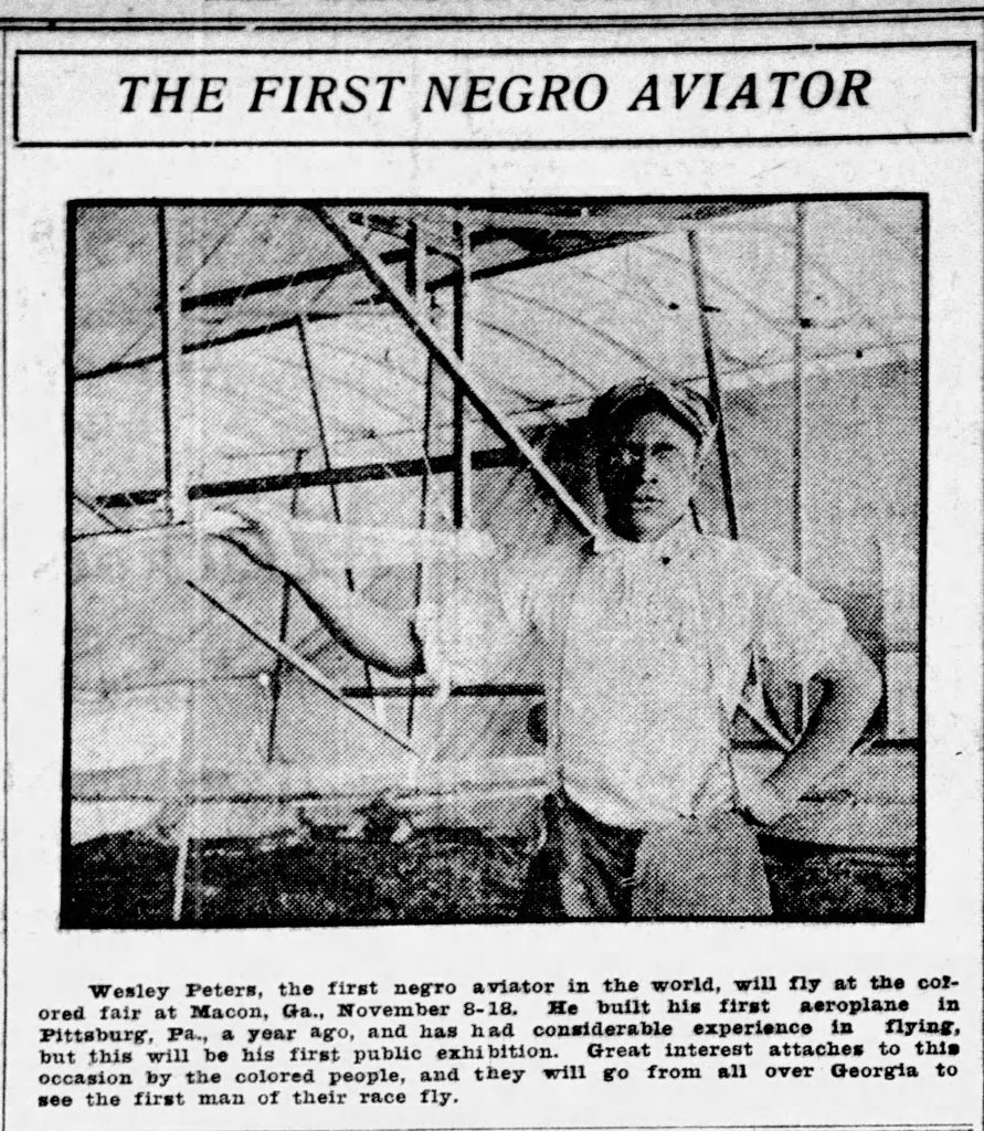 Black-and-white newspaper clipping titled The First Negro Aviator shows a man before a biplane with article about Wesley Peters below. *AI generated alt text