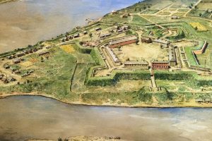 A detailed illustration of a star-shaped historic fort by a river, with buildings, green fields, docks, walls, and country roads. *AI generated alt text