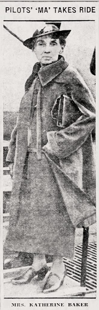 Black-and-white photo of Mrs. Katherine Baker in a long coat and hat outdoors, captioned “PILOTS’ ‘MA’ TAKES RIDE.” Name below. *AI generated alt text