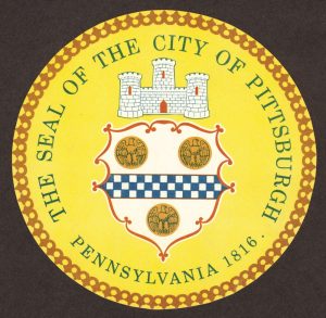 Circular City of Pittsburgh seal with a castle over a shield, checkered and eagle motifs, and green text: The Seal of the City of Pittsburgh Pennsylvania 1816. *AI generated alt text